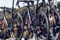 Professional road bicycles on roof of team car at a race