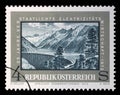 Stamp issued in the Austria shows Water Reservoir Zemm, the 25th Anniversary of Nationalized Electricity