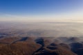 Zagreb Skyline in Croatia. Sunset Light Colorful Sky in Background. View from the top of Medvednica Mountain.  Haze Background Royalty Free Stock Photo