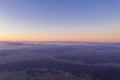 Zagreb Skyline in Croatia. Sunset Light Colorful Sky in Background. View from the top of Medvednica Mountain.  Haze Background Royalty Free Stock Photo