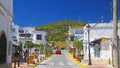 Typical coastal spanish atlantic ocean white idyllic village, empty streets, green hill, blue sky