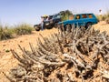 Zaida, Morocco - April 10, 2015. Toy car in terrain as a comparison of real cars of Range Rover Classic