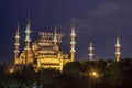 `Zakat increases and protects wealth` lettering hanging on Blue Mosque`s mahya in Istanbul,Turkey.