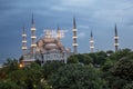 `Zakat increases and protects wealth` lettering hanging on Blue Mosque`s mahya in Istanbul,Turkey.