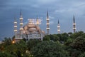 `Zakat increases and protects wealth` lettering hanging on Blue Mosque`s mahya in Istanbul,Turkey.