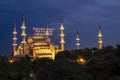 `Zakat increases and protects wealth` lettering hanging on Blue Mosque`s mahya in Istanbul,Turkey.