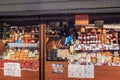 ZAKOPANE, POLAND - JANUARY 06, 2016: Selling of sheep cheese and high mountain honey on the street market in Zakopane in the sunny