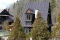 Wooden house with a steep roof