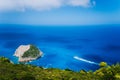 Zakynthos fantastic west coastal view with white cliff. White tourist ship sailing full speed on open azure sea water