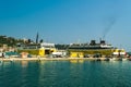 Zakynthos, Greece Andreas Kalvos and Mare di Levante Ferries car passenger boats with distinctive colors and logo moored on a calm