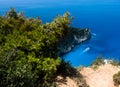 Zakynthos Island, Greece. View on boats, rocky shore and turquoise, crystal clear waters of Ionian Sea Royalty Free Stock Photo