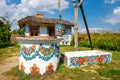 Zalipie, Poland, August 19, 2018: A bucket over a well in the colorful village - Zalipie, Poland. It is known for a local custom