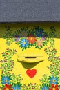 Old wooden beehives decorated with a hand painted colorful flowers, Zalipie, Poland Royalty Free Stock Photo