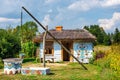 Traditional farmstead with a well in the colorful village of Zalipie, Poland. It is known for a