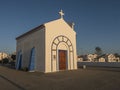 Zambujeira do Mar, Odemira, Portugal, October 27, 2021: View of white and blue chapel Capela da Nossa Senhora do Mar at