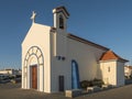 Zambujeira do Mar, Odemira, Portugal, October 27, 2021: View of white and blue chapel Capela da Nossa Senhora do Mar at