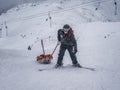 Zams, Austria - 22 Februar 2015: Mountain rescue team member with special stretcher for mountain rescue