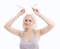 Zany young woman with blond dreadlocks kidding around Royalty Free Stock Photo