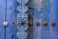 Zanzibar blue carved door with carving details.