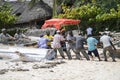 Fishermen on the beach of Zanzibar Island. Royalty Free Stock Photo