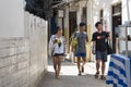 Tourists tour the stone town of Zanzibar.