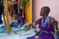 Beautiful masaai women weaving necklace and local jewelry