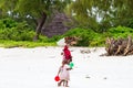 Unknown children playing on Paje beach