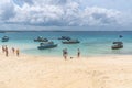 Tourists wait for boats on Prison Island (Changuu Island) to return to Zanzibar mainland