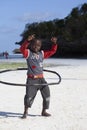 African kid playing with hula hoop on the beach Royalty Free Stock Photo