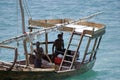 Zanzibari men in a fishing boat, Stone Town, Zanzibar, Tanzania Royalty Free Stock Photo