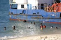 Zanzibari people having bath in the sea, Stone Town, Zanzibar, T