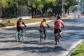 Zapopan, Jalisco Mexico. January 1, 2023. Three cyclists riding their bikes on paved street