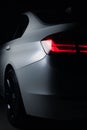 Zaporizhia, Ukraine, March 8, 2020. BMW 328i, white car close-up on a black background