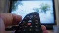 zapping through TV channels with remote control