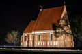 Zapyskis, Lithuania November 04 2020: early Gothic red brick church built between 1530 and 1578 In Lithuania, Zapyskis at night Royalty Free Stock Photo
