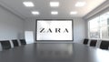 Zara logo on the screen in a meeting room. Editorial 3D rendering