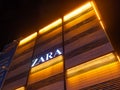 Zara store beautifully illuminated at night, in Bucharest