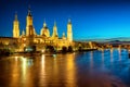 Zaragoza city, Spain, view over river to Cathedral at evening Royalty Free Stock Photo