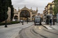 Zaragoza tram makes its stop at the market in the city center. Royalty Free Stock Photo