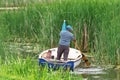 Old fisherman rowing boat. Royalty Free Stock Photo