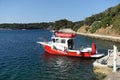 Zaton, Dubrovnik, Croatia - July 06, 2021: A fireboat designed for fighting shoreline and shipboard fires. Fireboat in Fire House Royalty Free Stock Photo