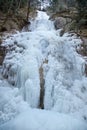 Zavojovy waterfall in winter in Falcon valley, Slovak Paradise National park, Slovakia Royalty Free Stock Photo