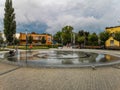 Zawiercie August 28 2018 Spiral splashing fountain at city center in cloudy day