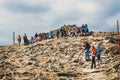 Hikers travel in the Babia Gora Mountain with a backpack