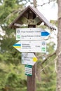 ZAWOJA, POLAND - SEPTEMBER 16, 2018: Hiking trail signpost in Polish Beskid Mountains with trails direction to Babia Gora Mountai