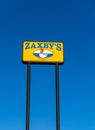 Zaxby`s restaurant sign, a fast food chain that serves fried chicken and a variety of other food items