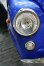 Headlight of the old blue car