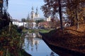 Zbaszyn, Poland - a cityscape view with a canal leading to a marina in the city center and  Saint Mary church water reflections Royalty Free Stock Photo
