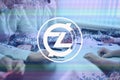 ZClassic, ZCL cryptocurrency sign. The concept of business, cryptocurrency and finance - a team of businessmen are sitting in an