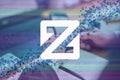 ZCoin, XZC cryptocurrency sign. Business person, trader, investor, analyst using mobile phone app analytics to analyze